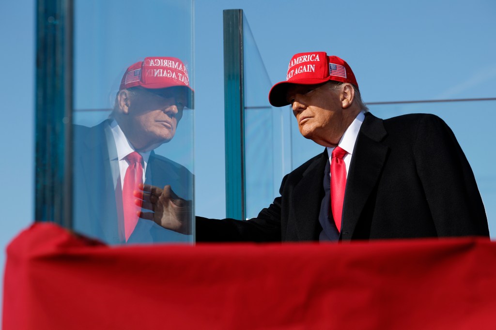 Trump riffs at rally that a sniper would have to ‘shoot through the fake news’ to get to him