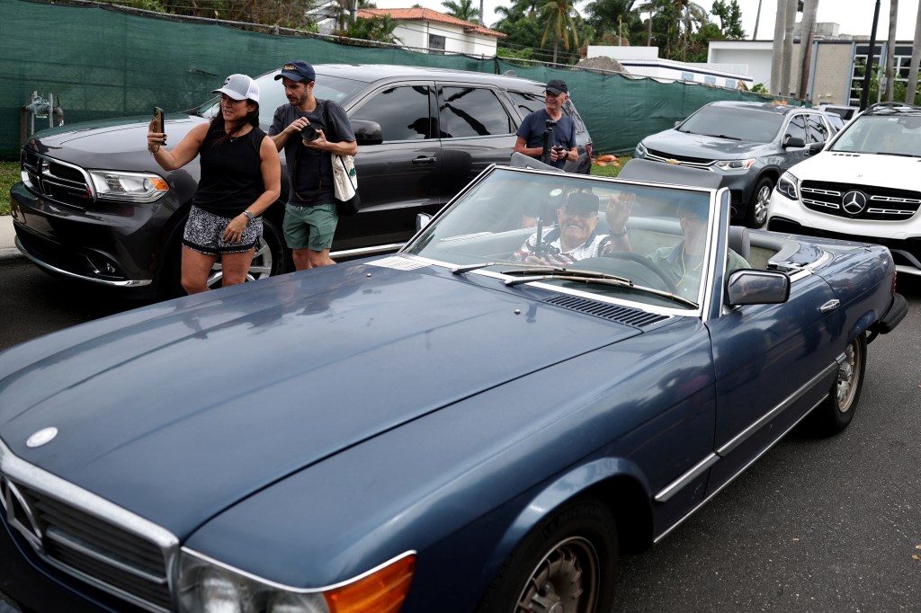Rudy Giuliani shows up to Trump polling site in vintage Mercedes he’s been ordered to surrender to election workers he defamed