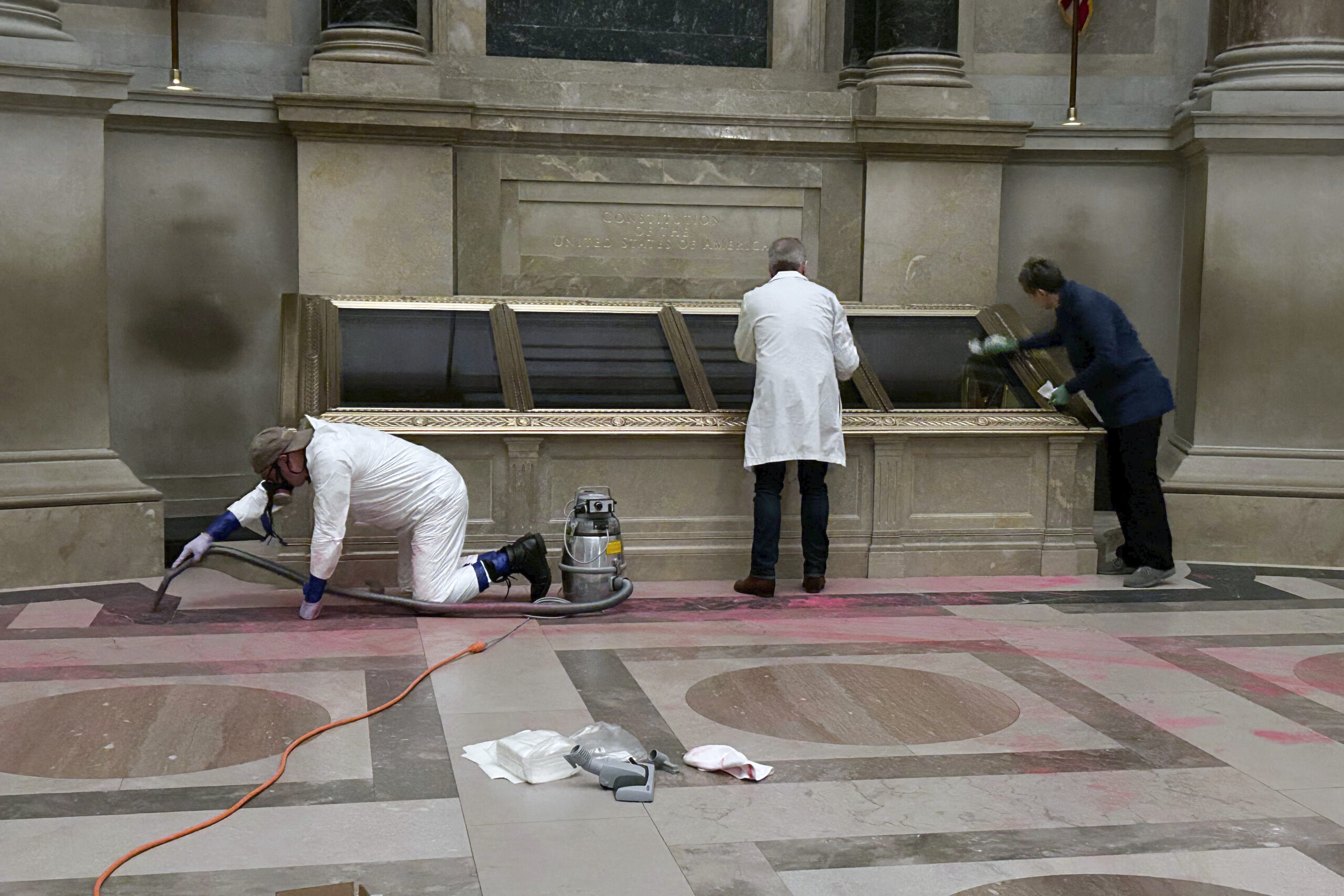 Archivist says vandals who threw paint on encased founding documents ‘assaulted’ the ‘beliefs which unite us’