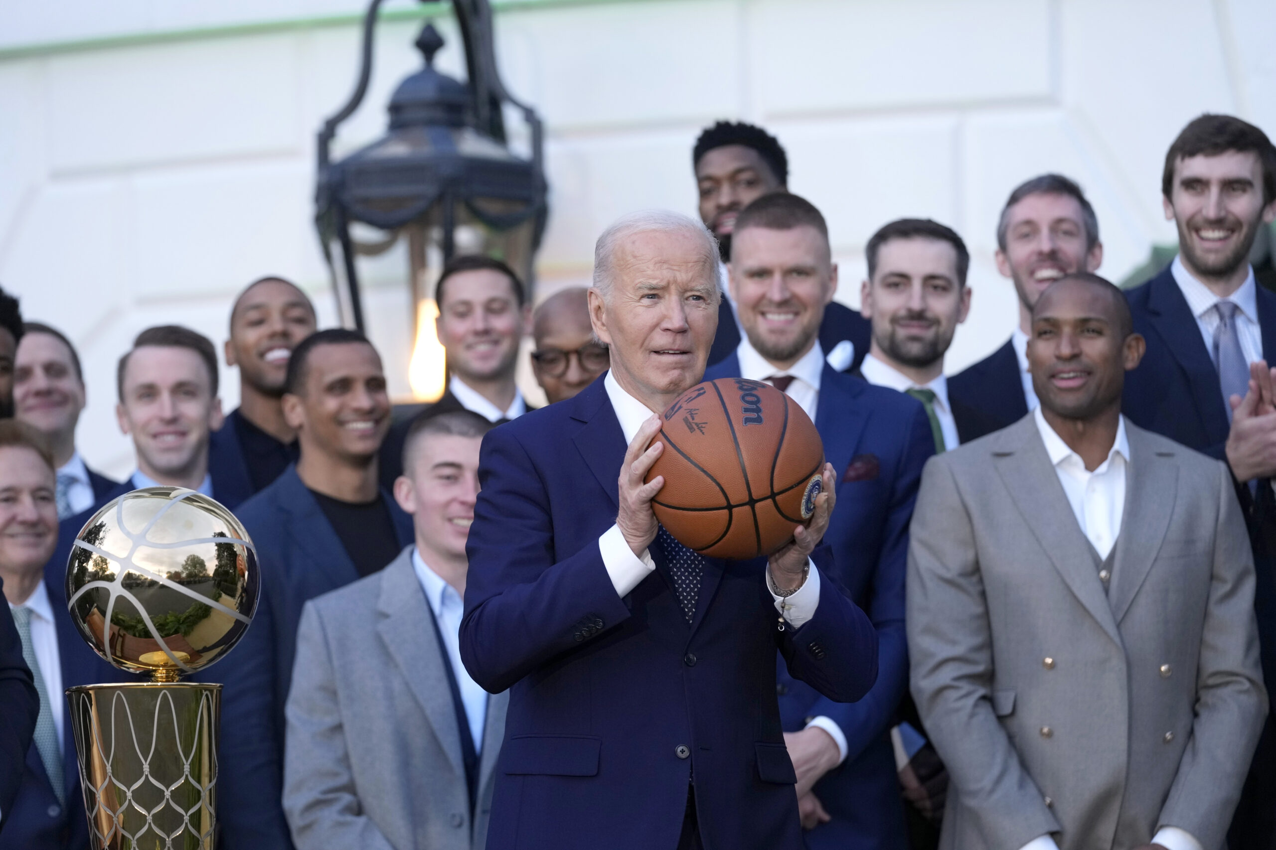Biden jokes, dribbles basketball as he hosts NBA champs in first event since turning 82: ‘You’re Celtics, right?’