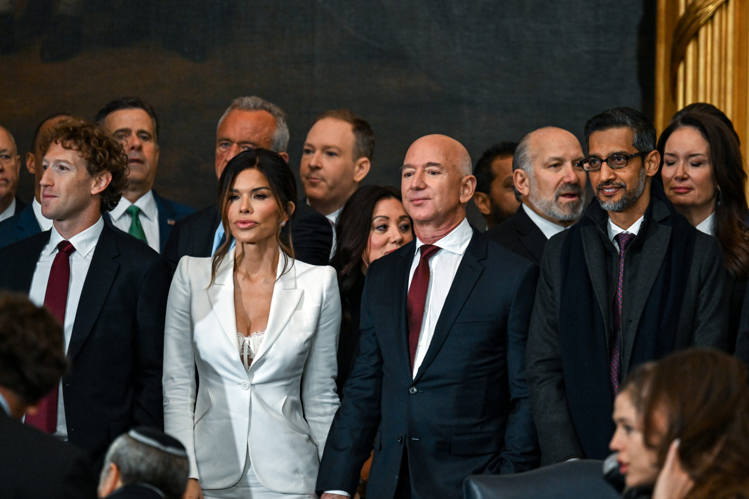 Trump’s billionaire frenemies get prime spots in Rotunda — as Govs. DeSantis, Abbott put in overflow room