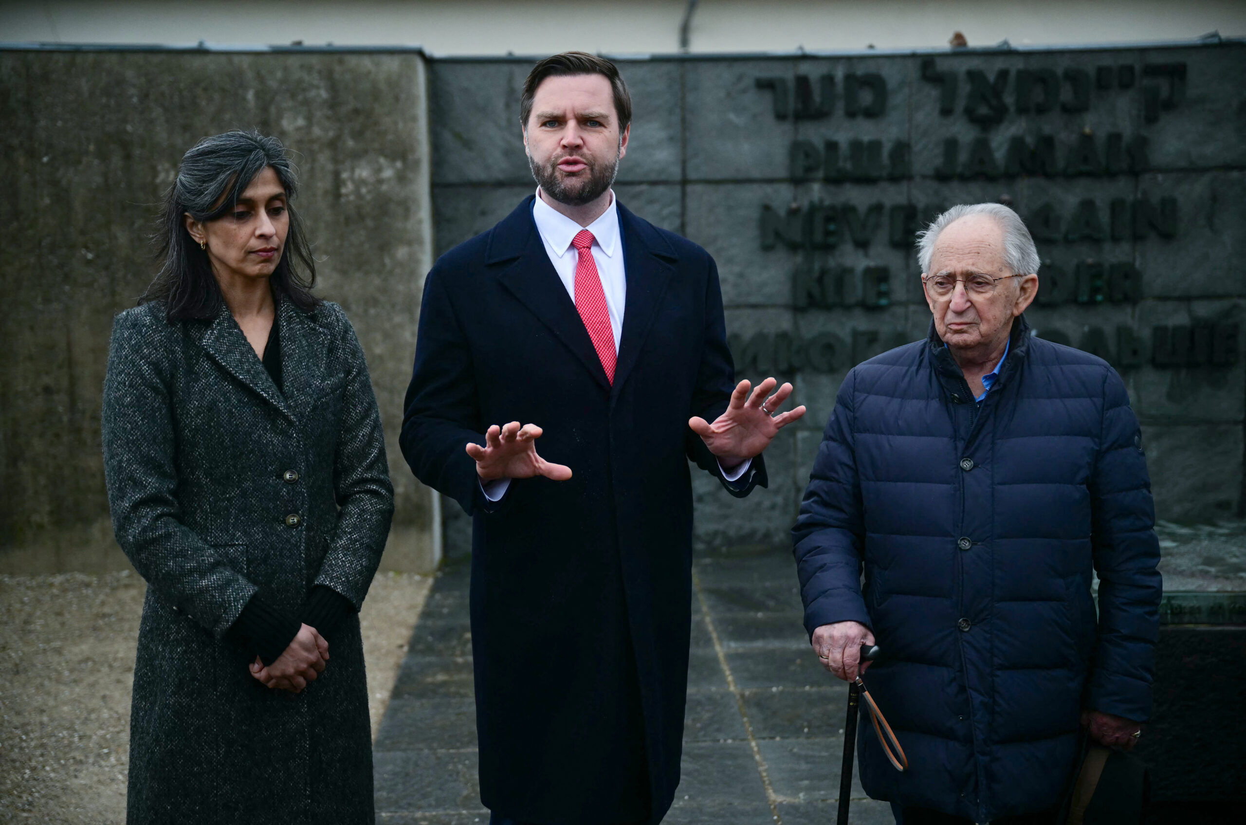 JD Vance meets Holocaust survivor on visit to Dachau concentration camp ahead of Munich Security Conference