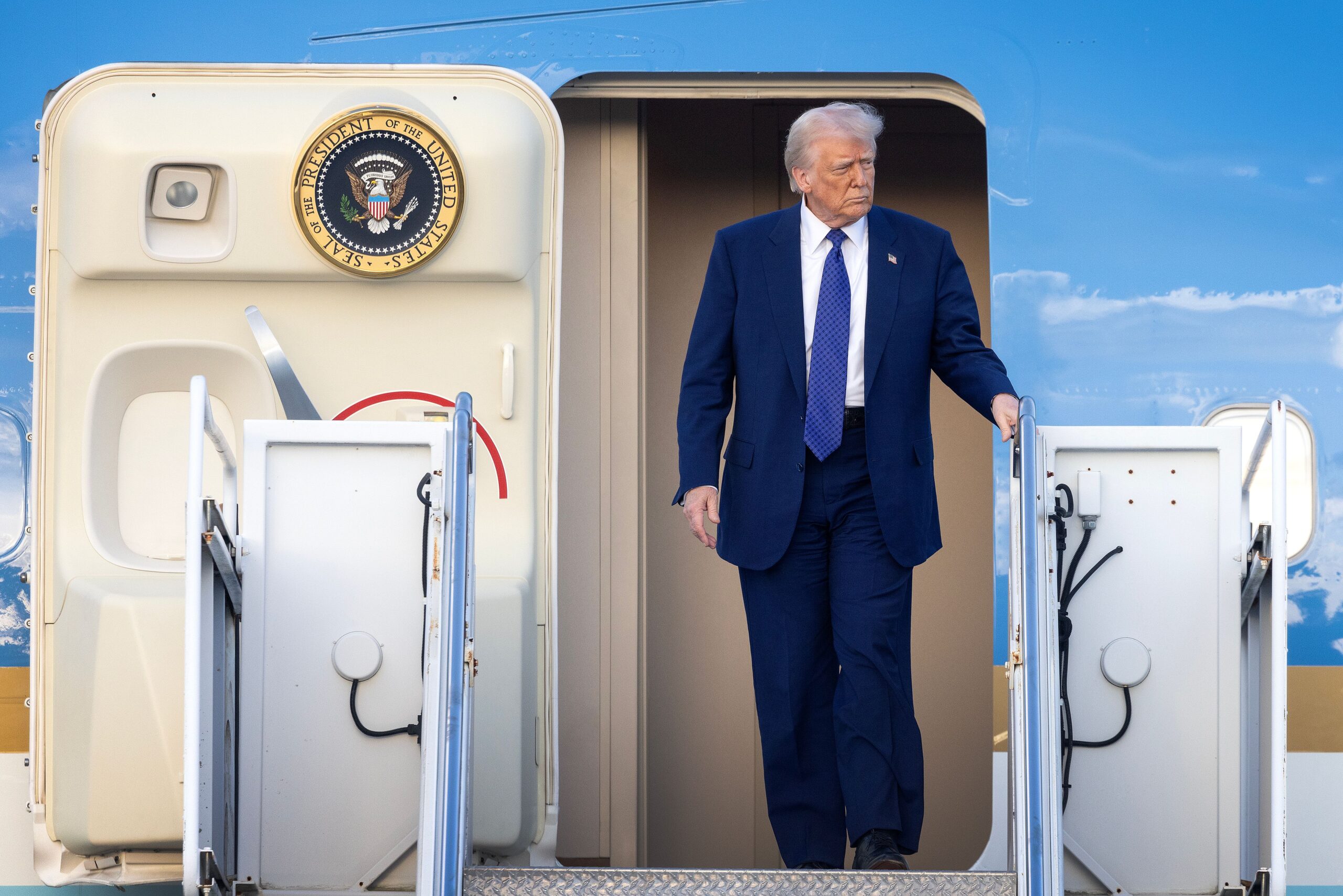 Trump tours Boeing plane to highlight aircraft maker’s delay in delivering a new Air Force One