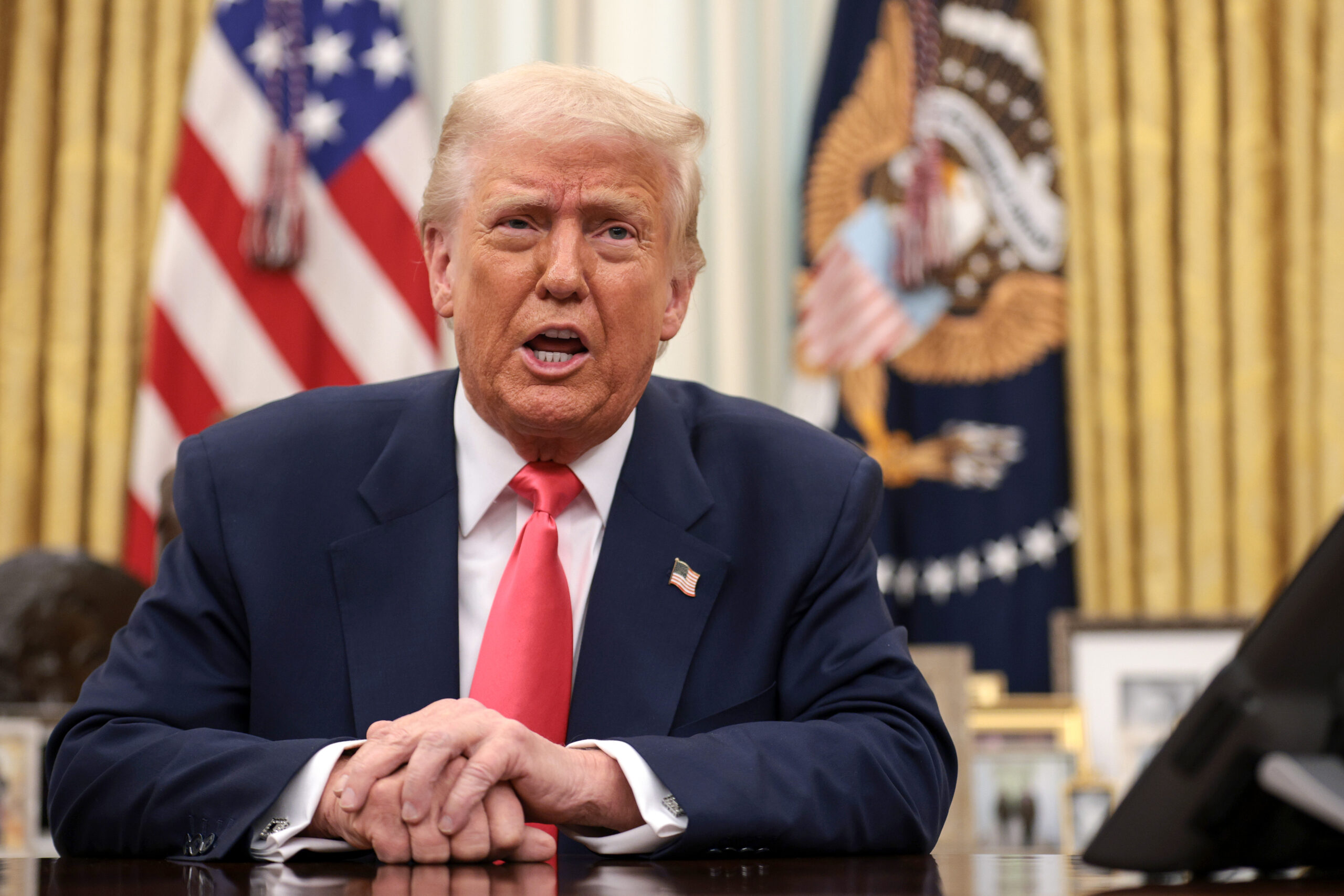 Law firm behind the Steele dossier sues Trump over executive order stripping its security clearances