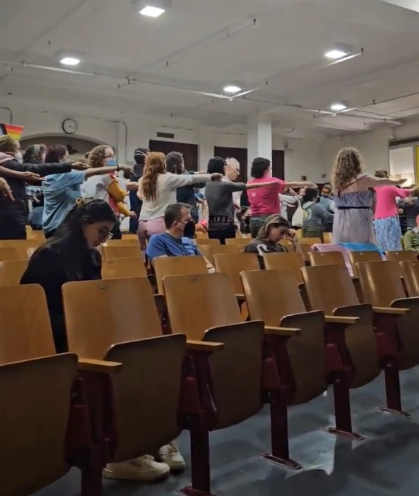 Trans activists storm NYC schools meeting, dance ‘Macarena’ to protest support of female athletes