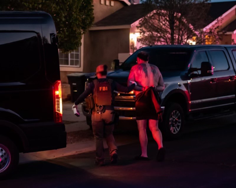Lipstick-wearing suspect in Tesla, GOP office firebombings hauled out shirtless in dramatic New Mexico raid
