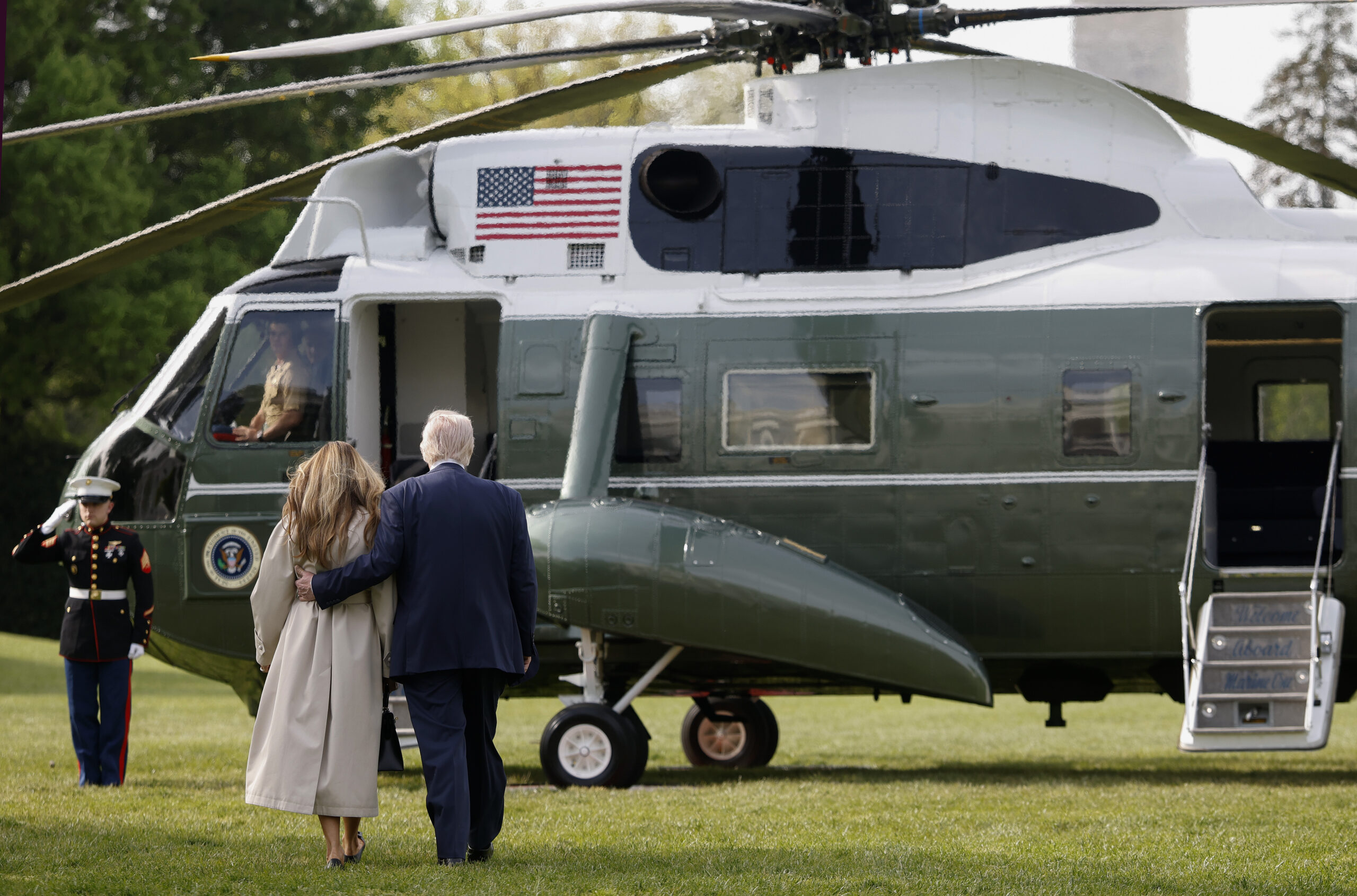 President Trump and Melania share PDA moment as they board Marine One for Pope Francis’ funeral