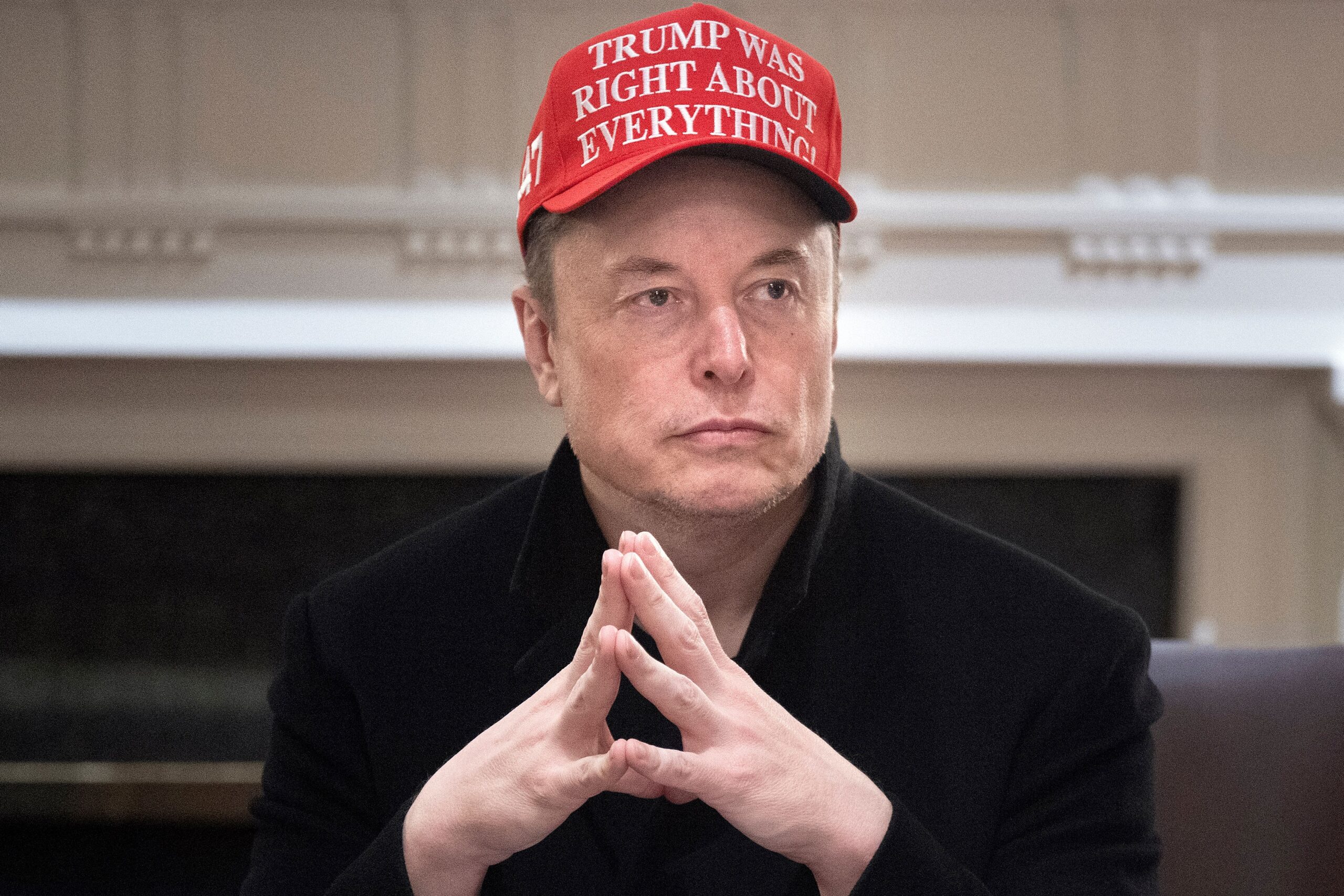 Elon Musk pushes back on Trump tariffs, with help of a pencil and economist Milton Friedman