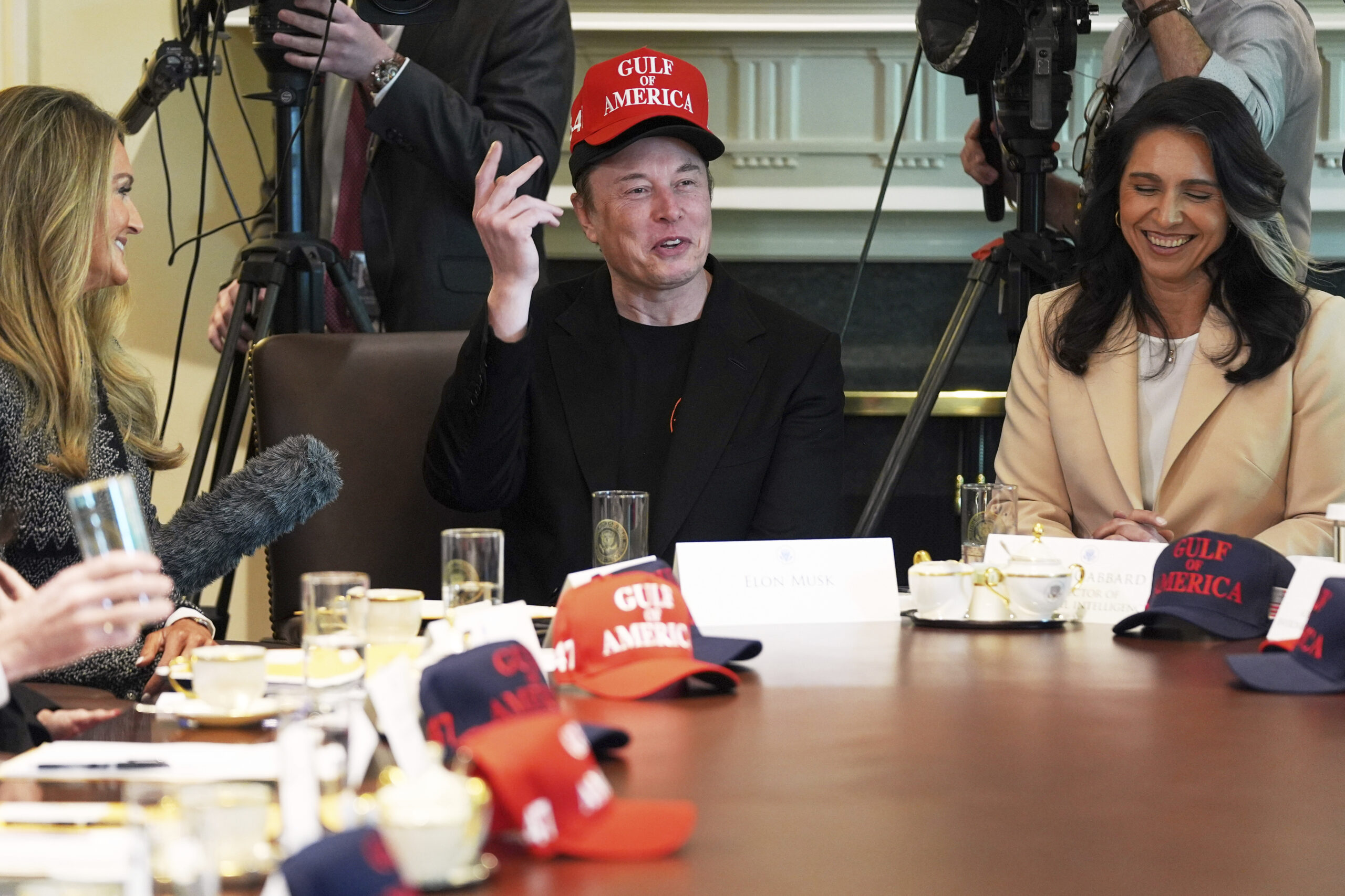 Elon Musk cap-tivates Trump at cabinet meeting as DOGE chief dons two caps: ‘Only one that can do that’