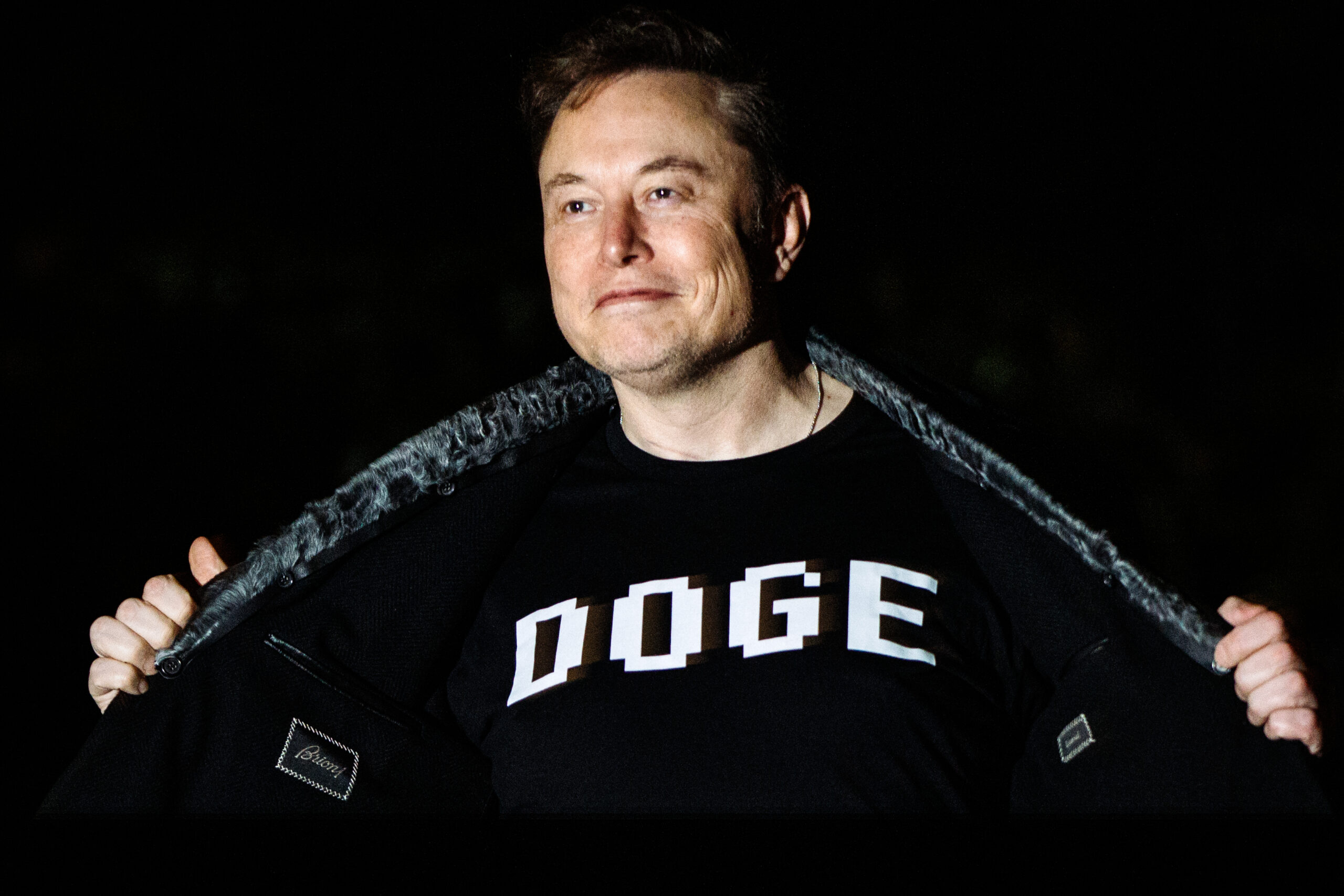 Elon Musk tells Tesla shareholders he’ll start cutting back on DOGE work next month