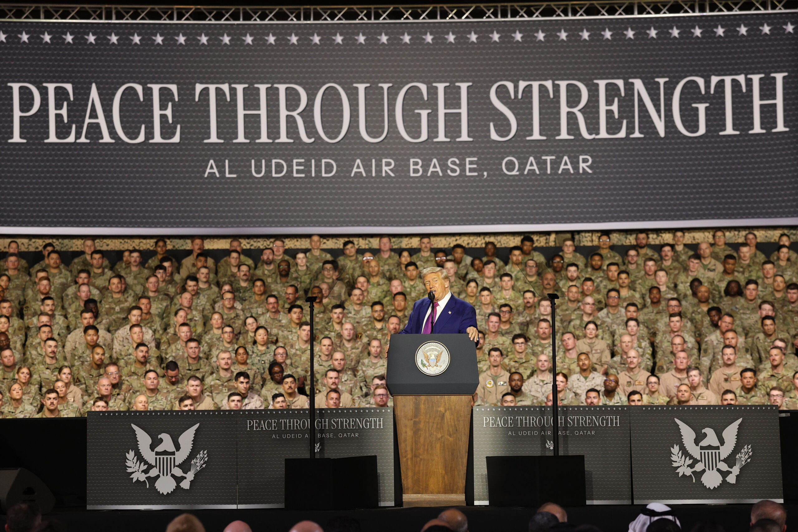 Trump praises crowd of cheering soldiers at biggest US military base in the Middle East, vows ‘substantial pay raises’