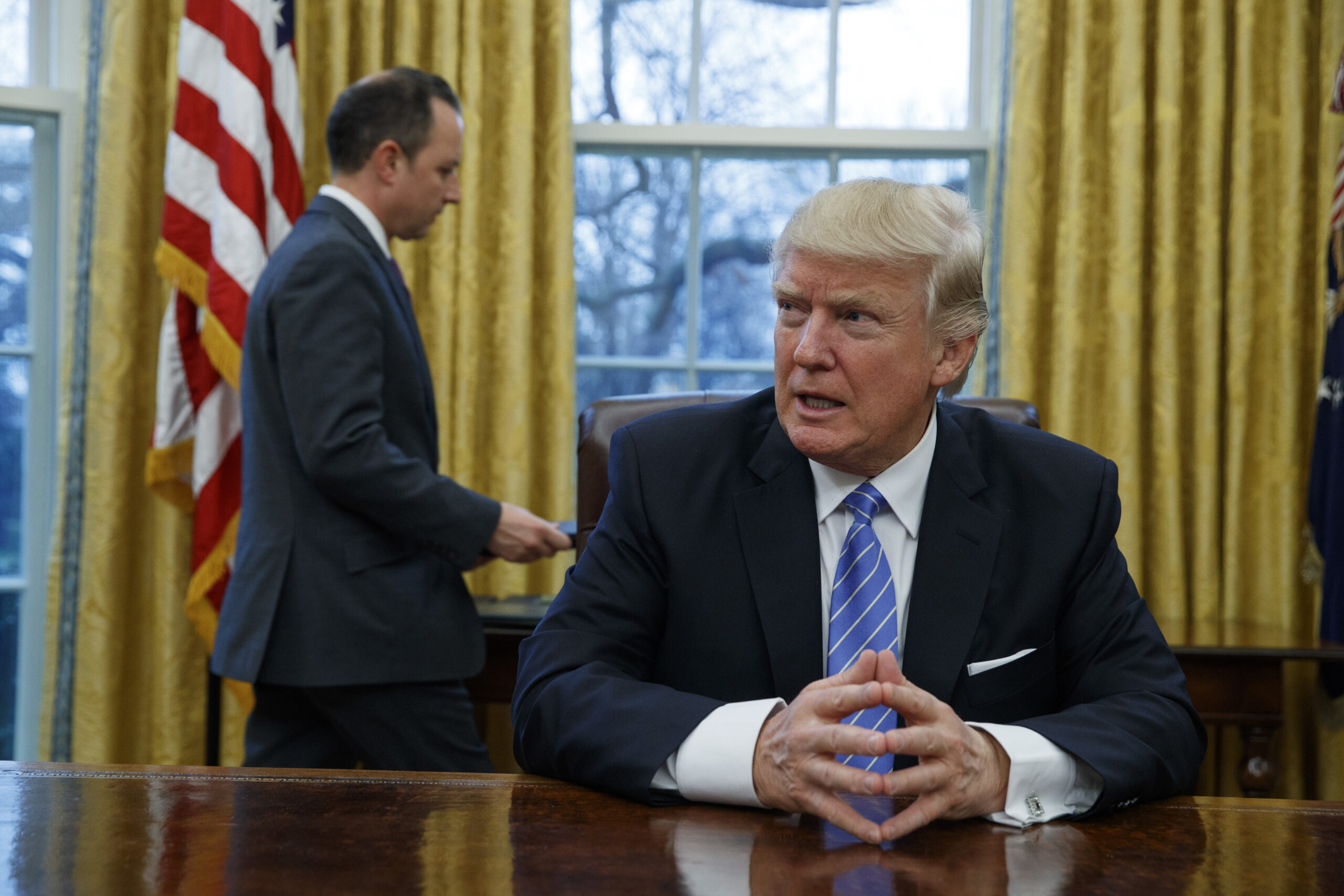 Trump summons Federal Reserve chair to demand interest rate cut