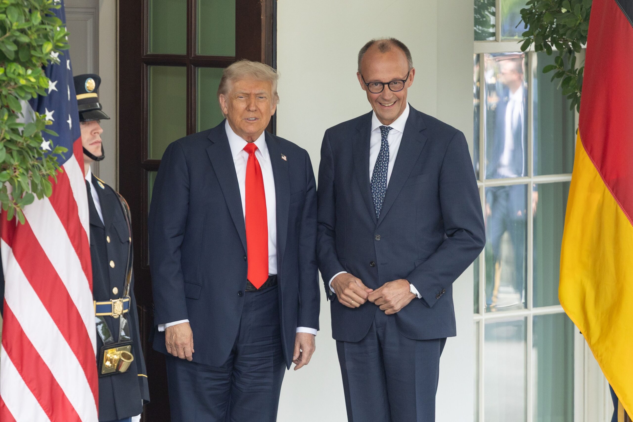 Trump’s open to discussion and committed to NATO, Germany’s chancellor says