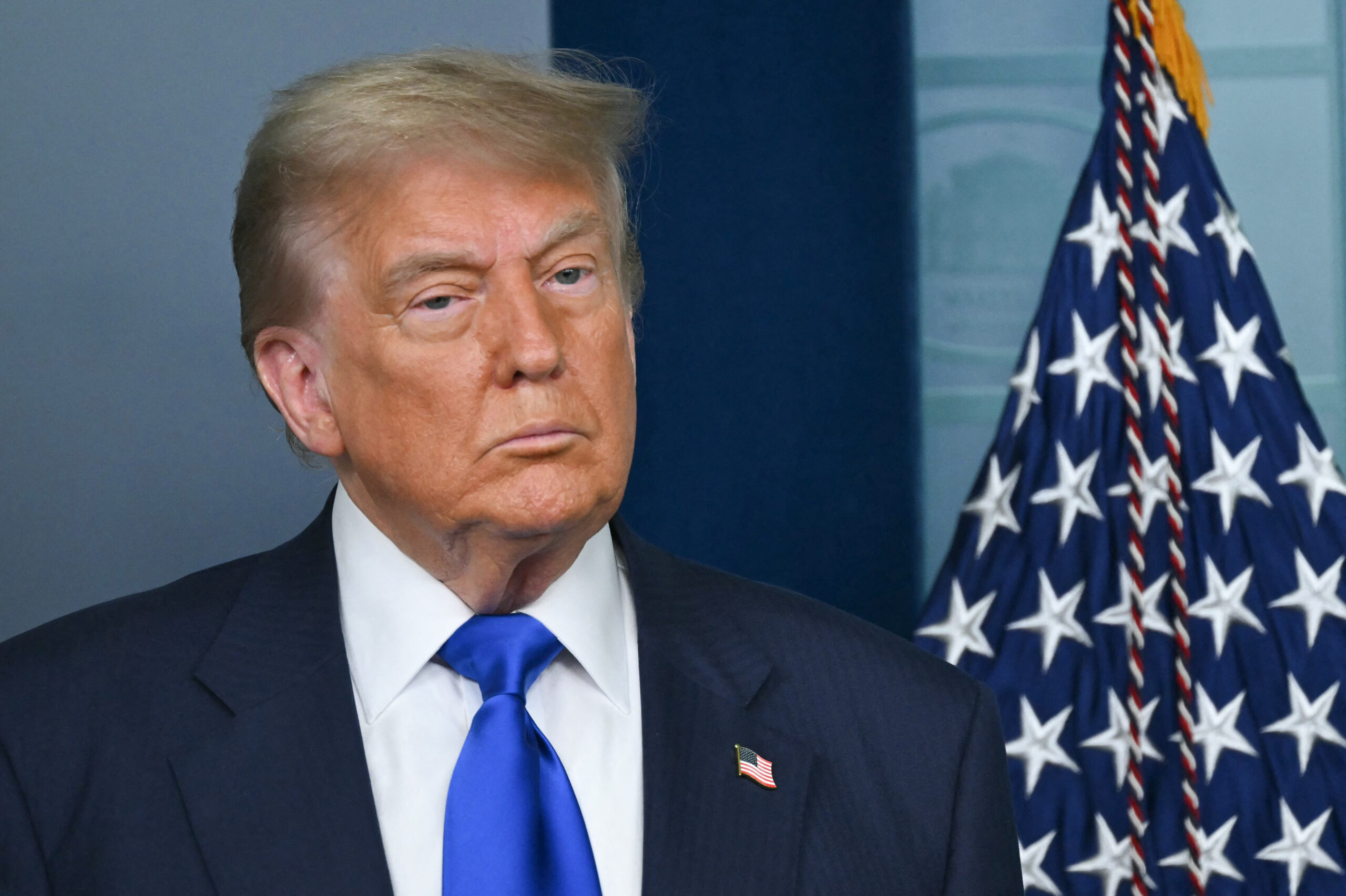 Trump ramps up fight with Harvard with threat to its accreditation, potentially jeopardizing its student aid