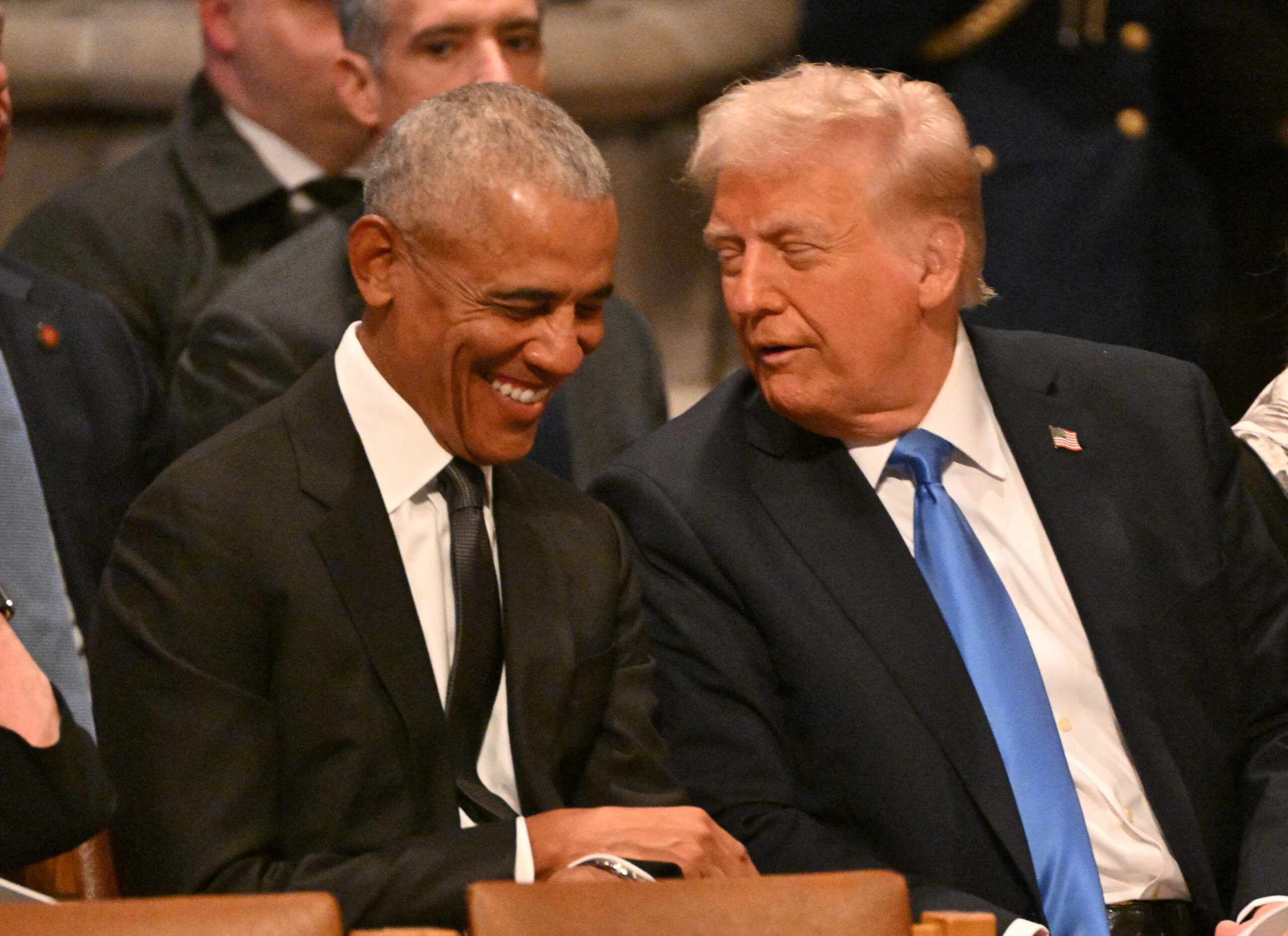 Here’s what Trump and Obama laughed and talked about at Jimmy Carter’s funeral, new book reveals