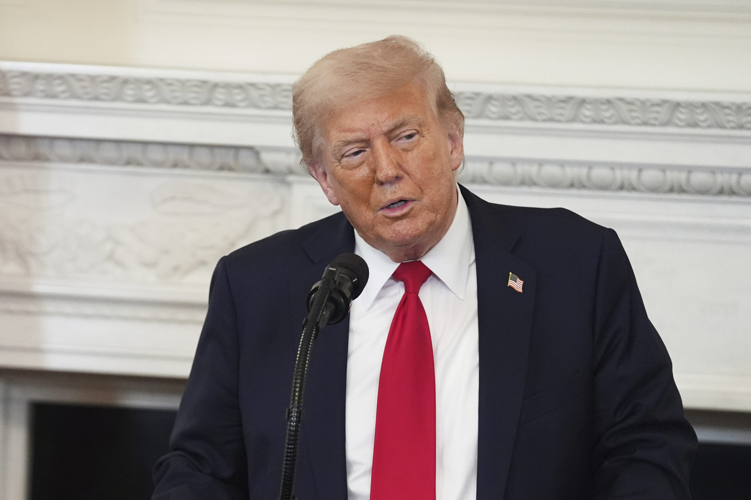 Judge stops Trump admin from using travel ban to keep 80 refugees out of US