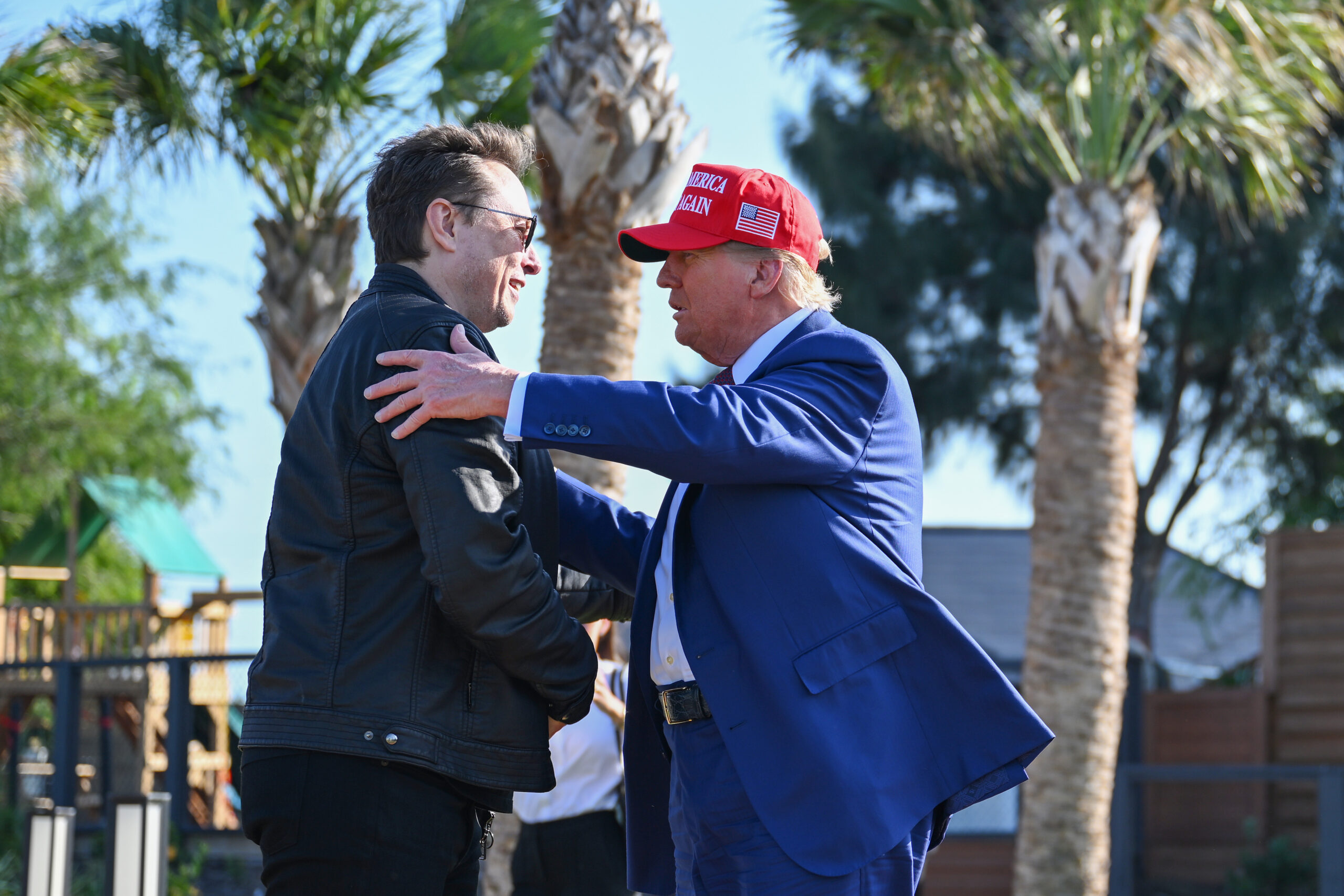 Trump walks back threat to strip fed money from Elon Musk companies as feud cools