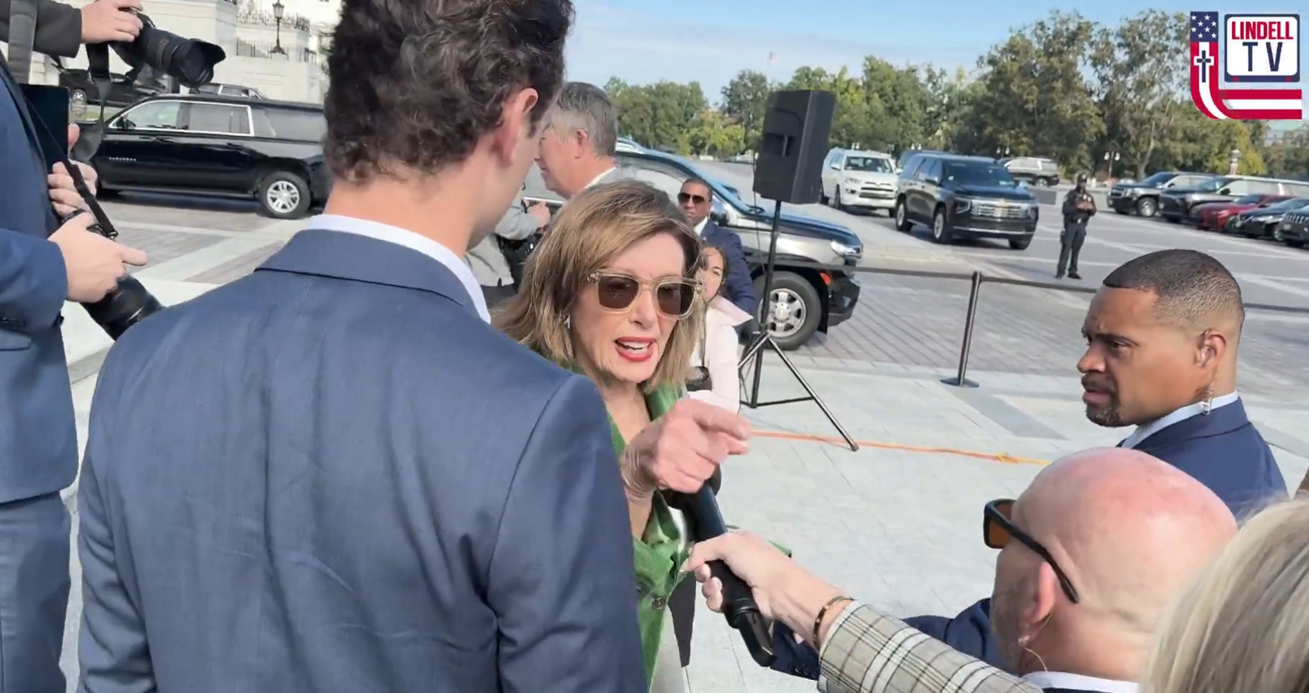 Nancy Pelosi – clutching the hand of an aide to walk – snaps at reporter asking about Capitol riot: ‘Shut up’