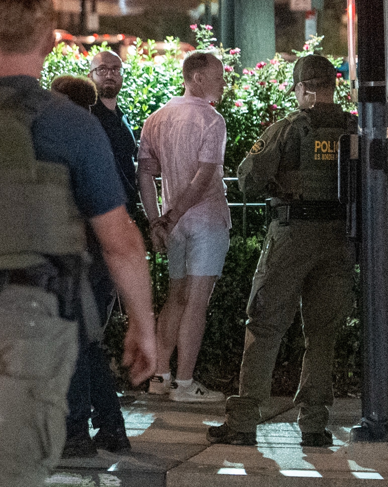 Fired DOJ employee found not guilty of assault after throwing sub sandwich at federal agent