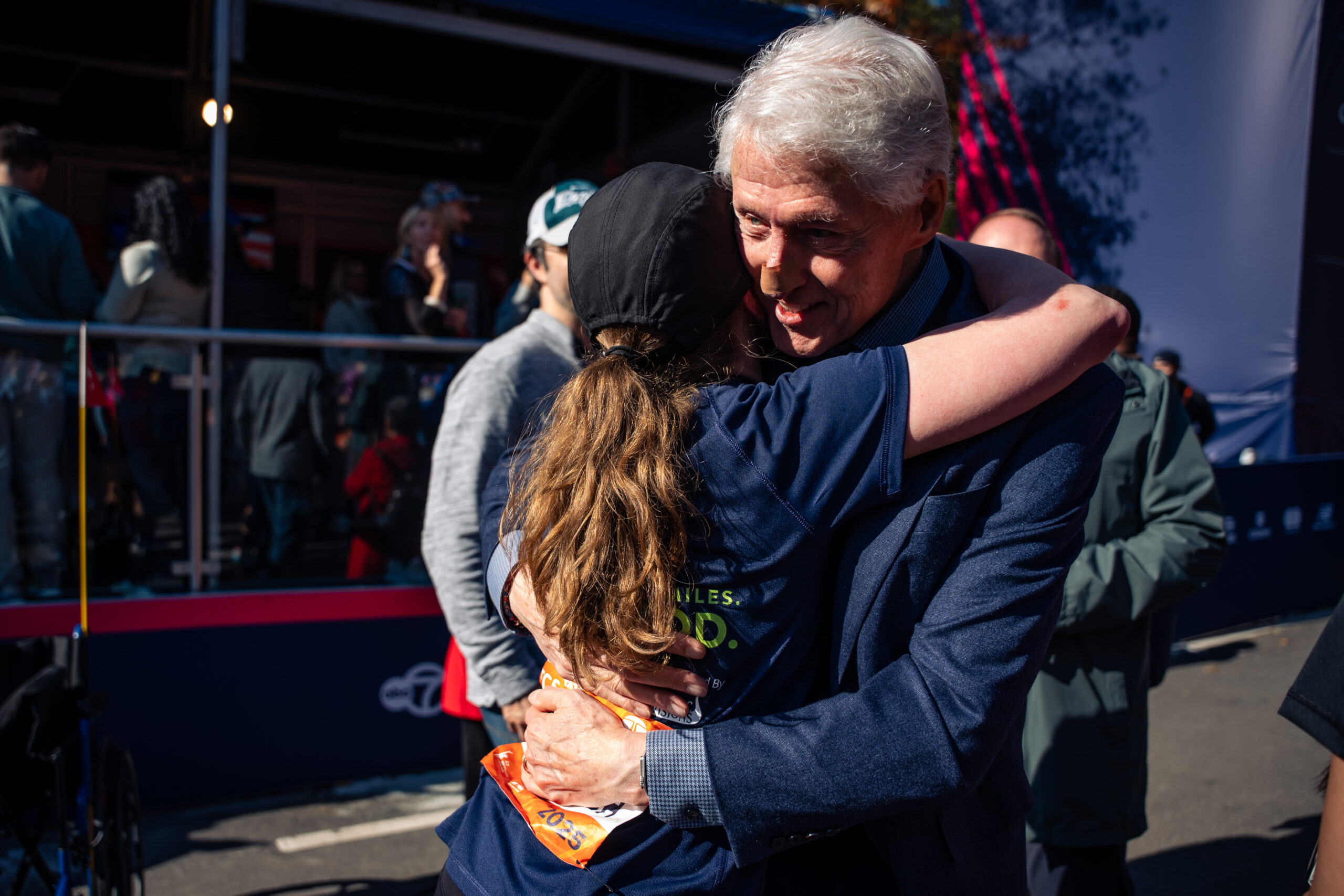 Bill Clinton shows up at NYC Marathon finish line with mysterious bandage