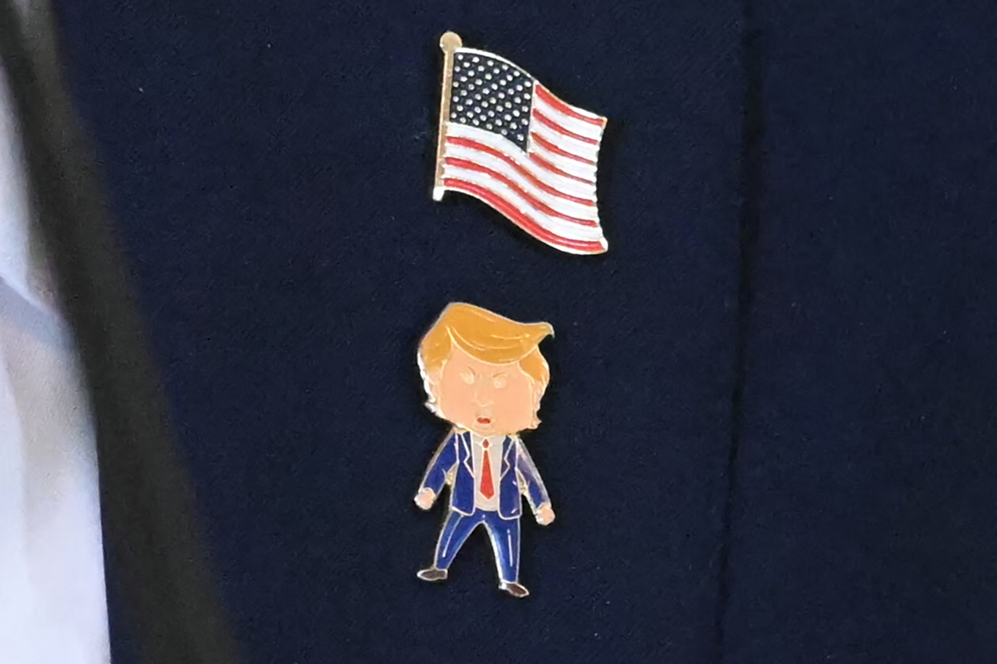President Trump wears ‘Happy Trump’ lapel pin of himself for oil magnate meeting