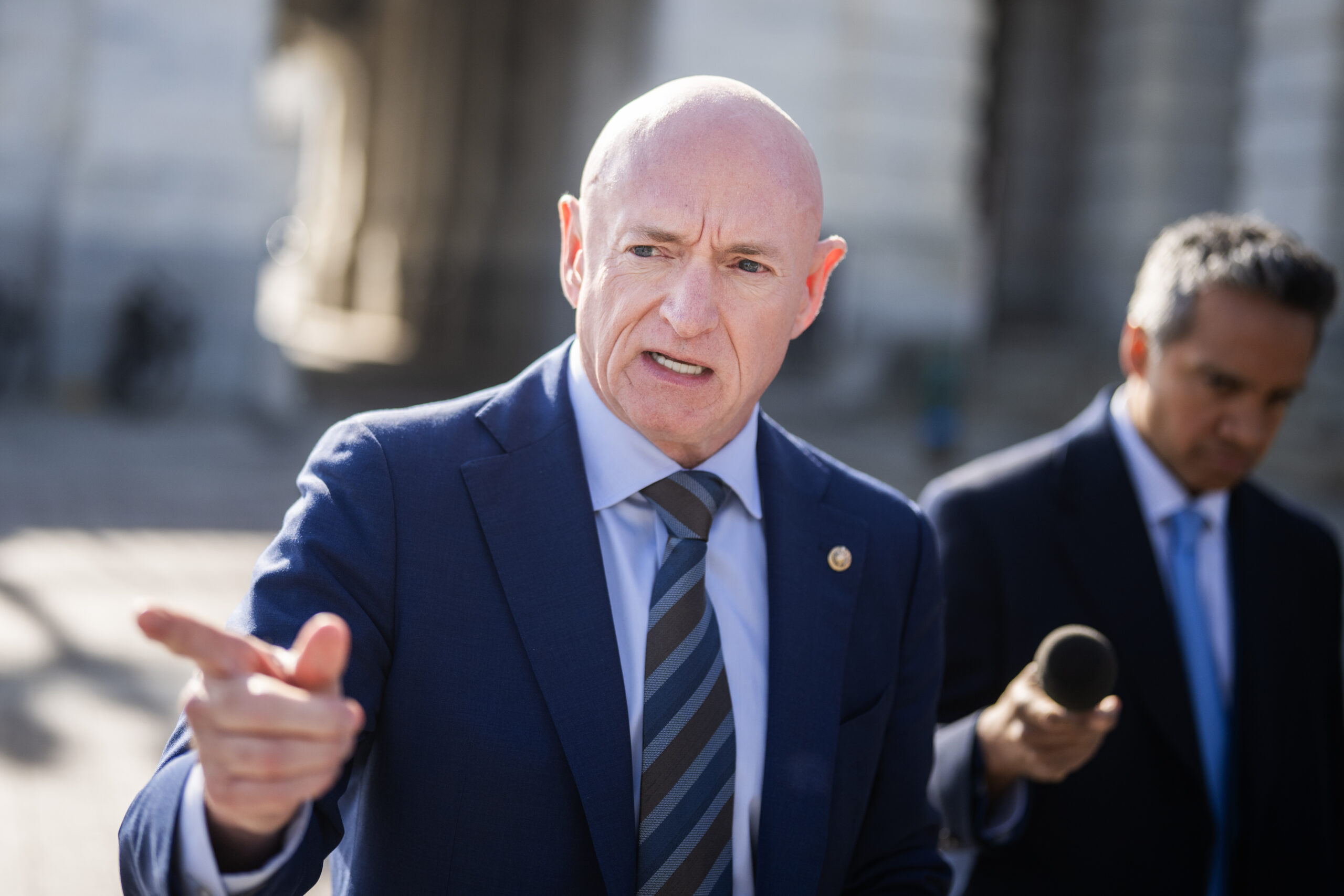 Mark Kelly sues Pete Hegseth to stop ‘unconstitutional’ pay cut, censure