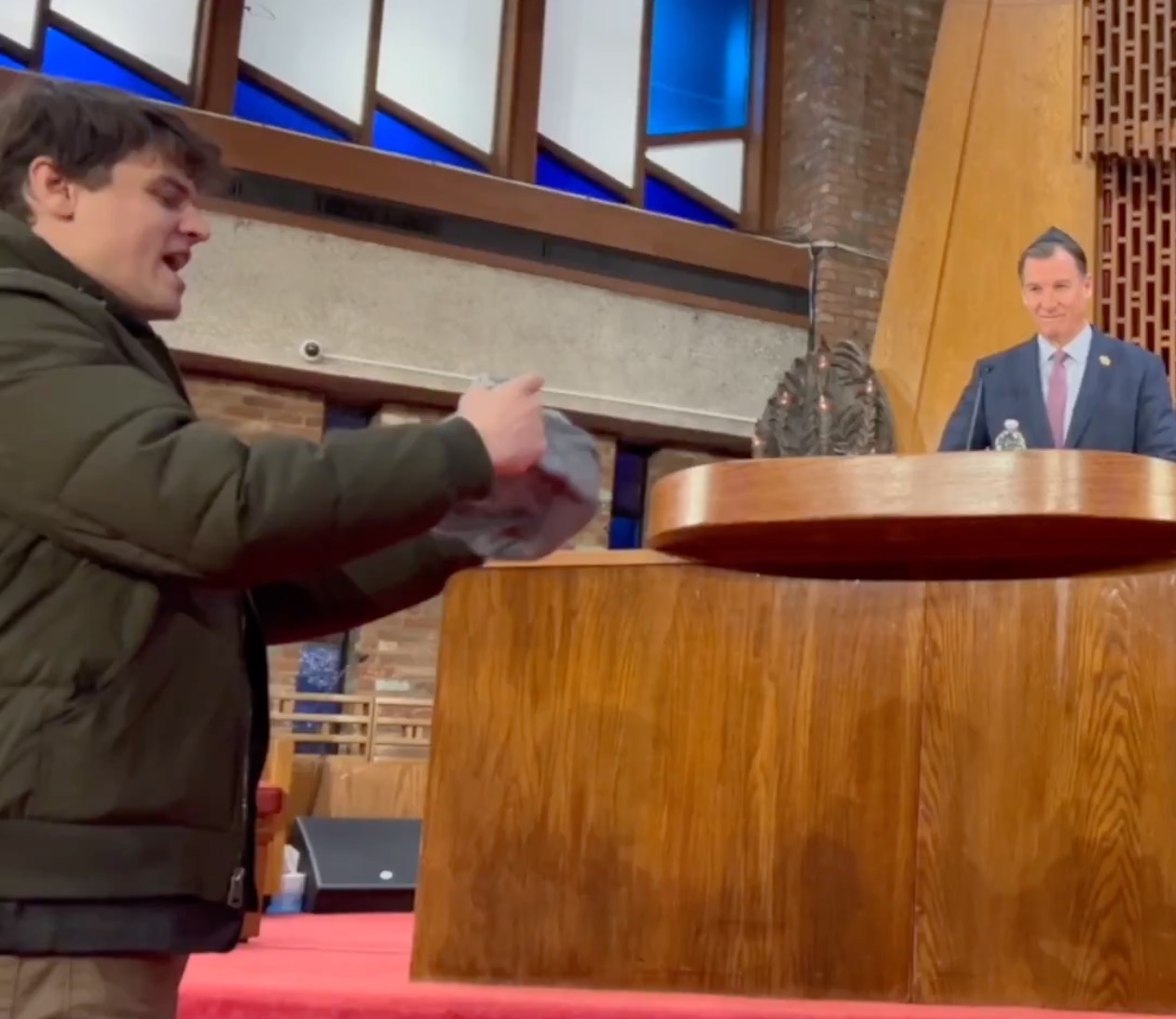 Lefty radicals storm Jewish temple and hurl obscenities, mock LI Dem Rep. Suozzi over his vote to boost ICE $$