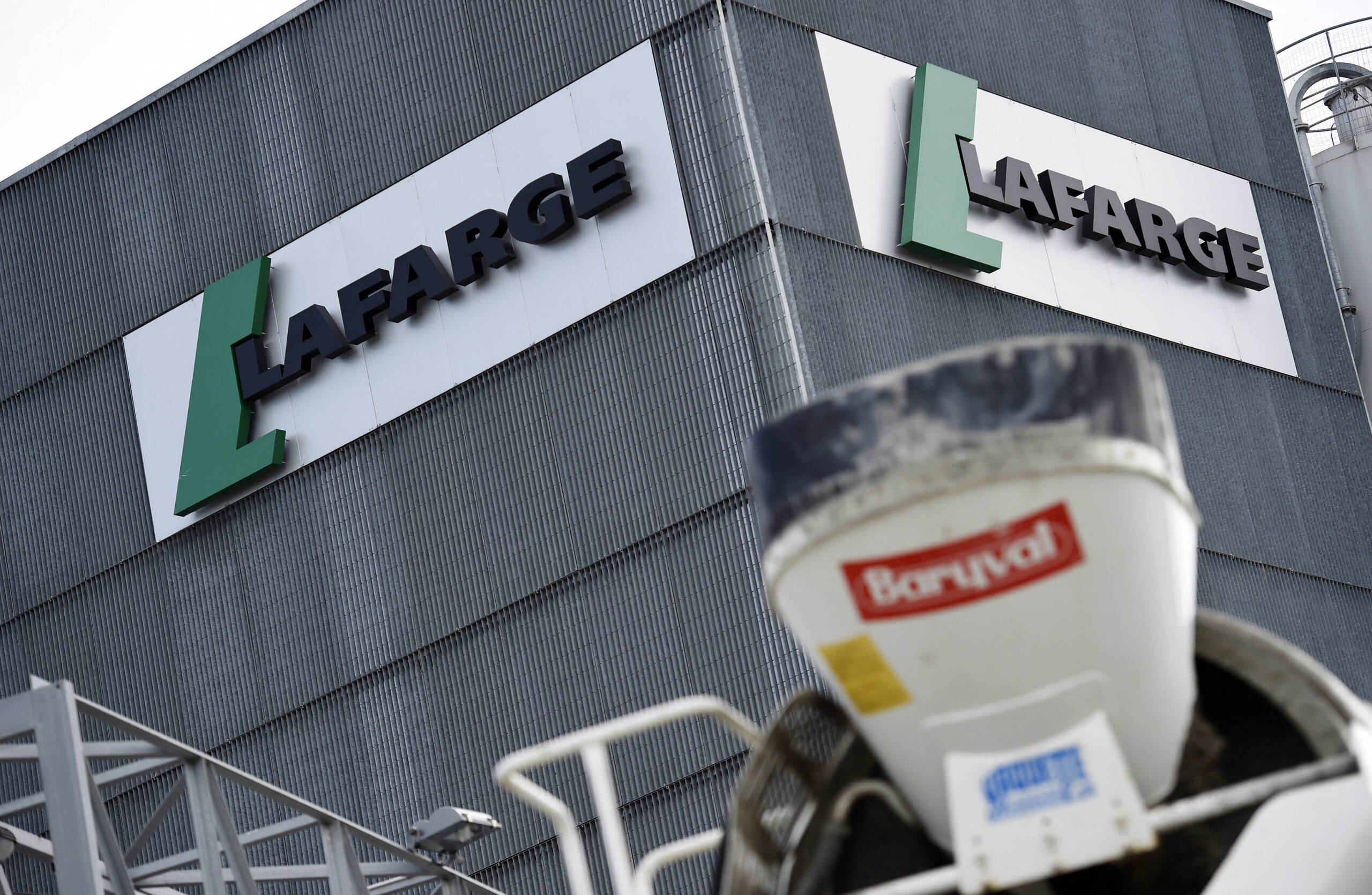 Military families demand DOJ distribute nearly $800M from French cement company found guilty of bribing ISIS