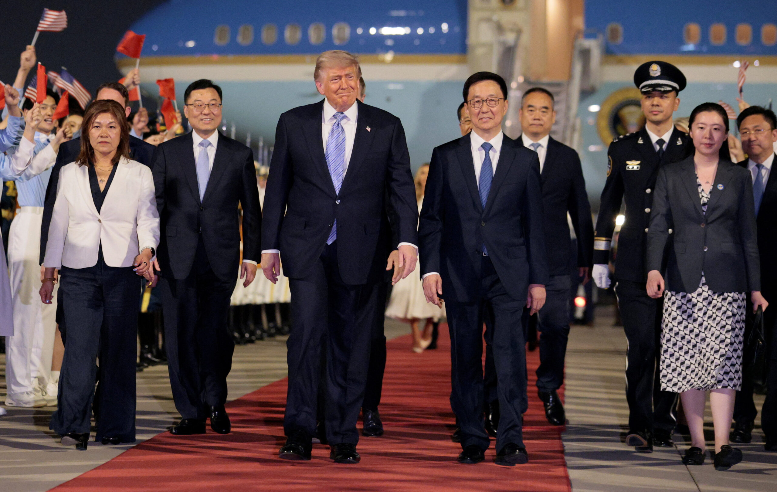 Trump gets red-carpet welcome after he lands in Beijing for closely watched summit with Xi Jinping