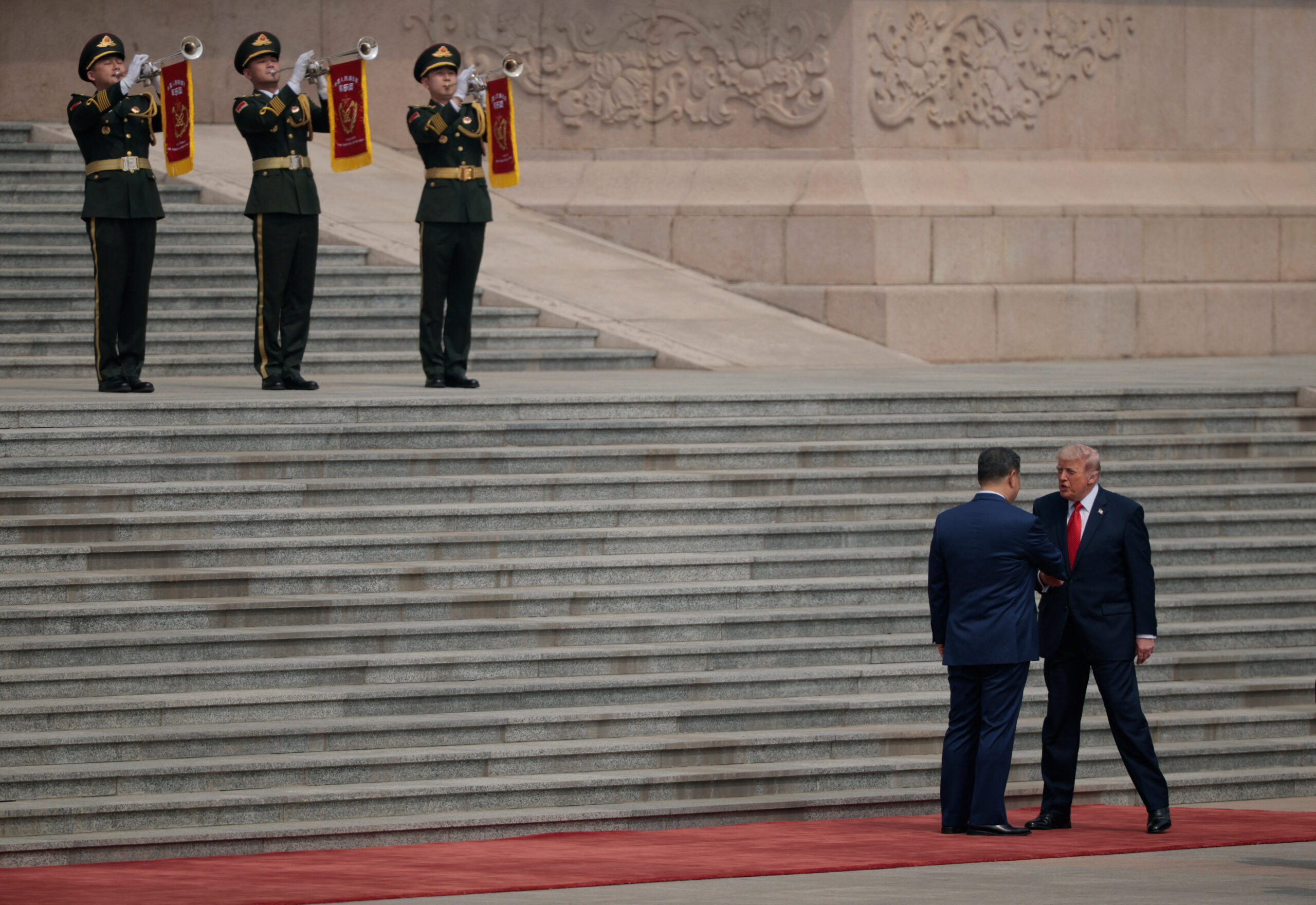 Trump greets Xi in Beijing to kick off historic China summit