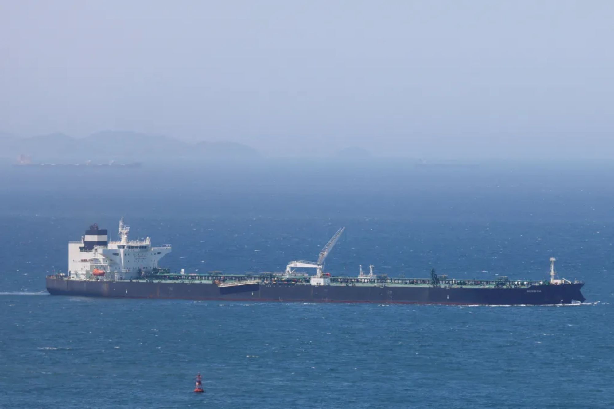 US revoking Iran’s license to sell oil after ‘wholly unacceptable’ attacks in Strait of Hormuz