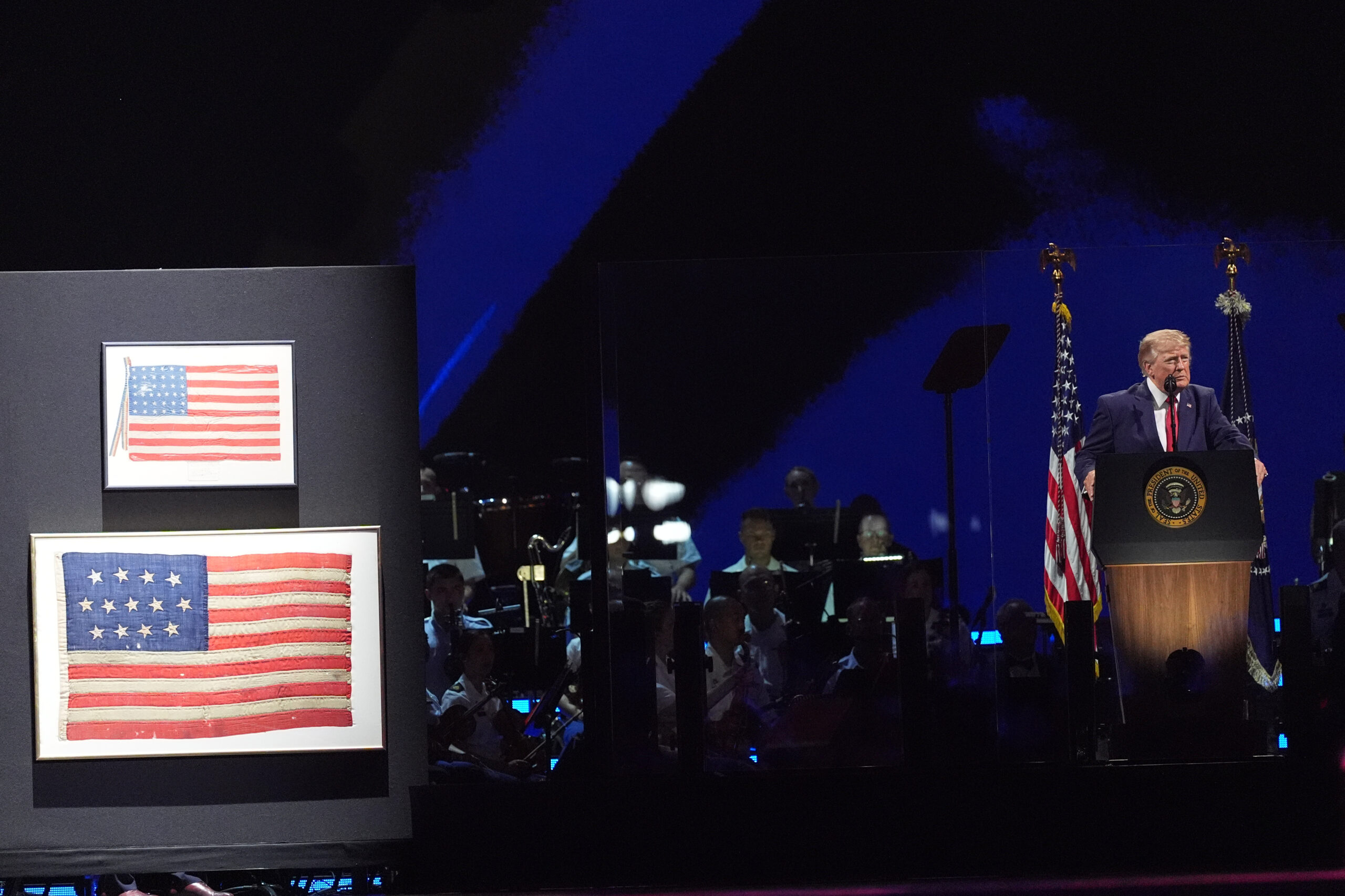 Trump has one of the country’s first flags on stage, dating from 1777, during Fourth of July speech