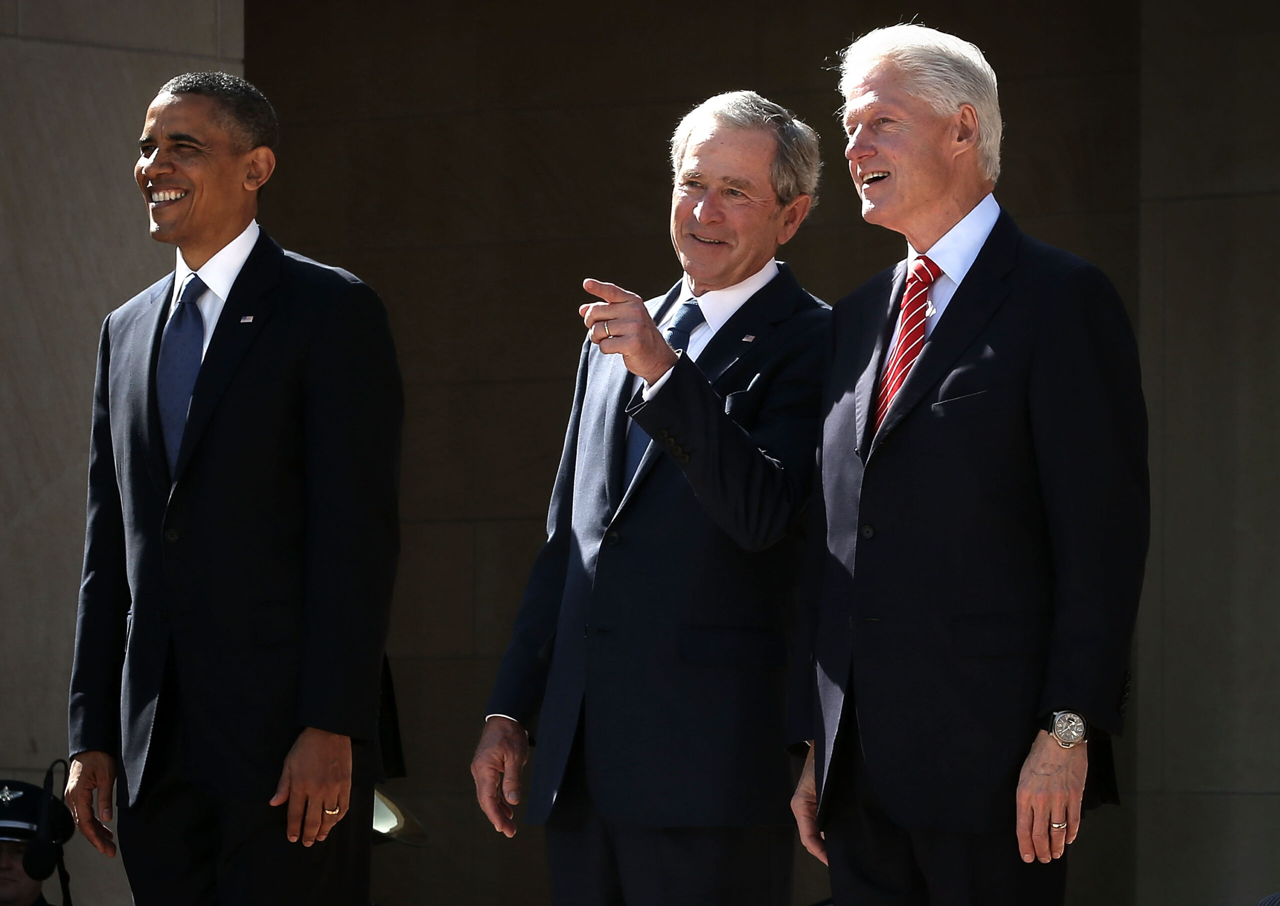 Trump goes unmentioned but not ignored as Clinton, Bush and Obama pen essays on US presidents