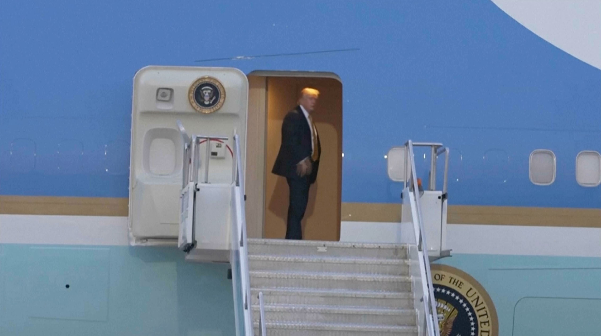 Video appears to show catering truck secretly moving Trump to military jet from Air Force One following NATO summit in Turkey